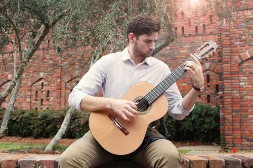 Eli Denson playing guitar